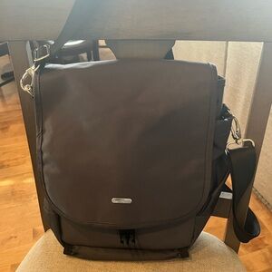 Waterproof messenger bag/backpack never used